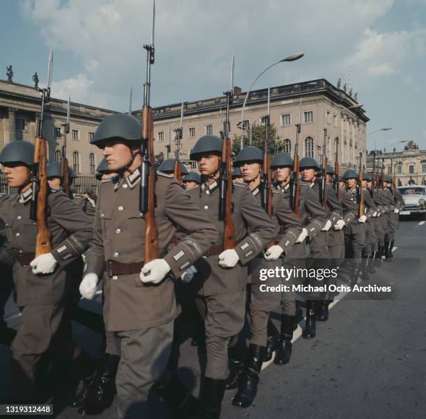 Soldiers of the National People's Army of the German Democratic Republic , carrying Gewehr 43 semi-automatic rifles, during the Changing of the...