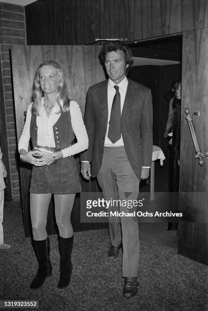 American actor and film director Clint Eastwood, and his wife, Maggie Johnson, attend the party for the annual celebrity tennis tournament, held at...