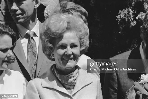 American First Lady Pat Nixon attends a wedding at St Andrew's Presbyterian Church in Newport Beach, California, 27th June 1970. The ceremony saw...