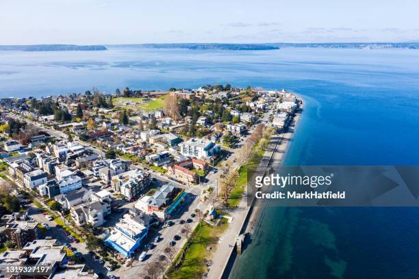 alki beach in seattle washington - seattle homes stock pictures, royalty-free photos & images