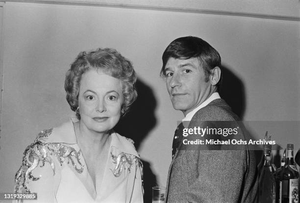 British-American actress Olivia de Havilland and British-born American actor Roddy McDowall attend a celebration remembering film producer David O...