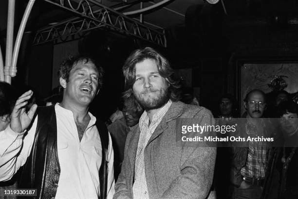 American actor Max Gail, wearing a leather waistcoat over a white shirt, and American actor and singer Jeff Bridges, wearing a tweed jacket over a...