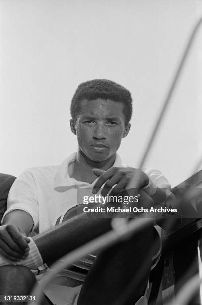 American tennis player Arthur Ashe takes a rest break during the Men's Singles Semifinal of the 1968 US Open, held at West Side Tennis Club in the...