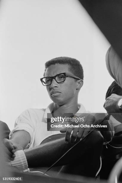 American tennis player Arthur Ashe takes a rest break during the Men's Singles Semifinal of the 1968 US Open, held at West Side Tennis Club in the...