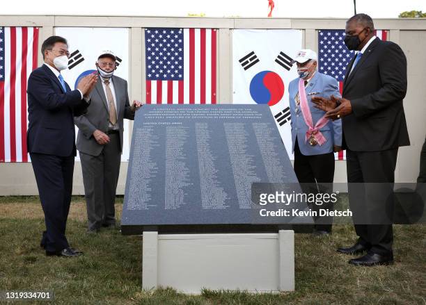 President Moon Jae-in of the Republic of Korea and U.S. Secretary of Defense Lloyd J. Austin unveil a replica section of the Wall of Remembrance at...