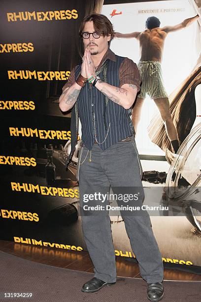 Johnny Depp attends the 'Rhum Express' Paris Premiere at Cinema Gaumont Marignan on November 8, 2011 in Paris, France.