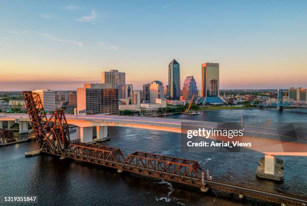 downtown jacksonville at sunset - aerial view - jacksonville stock pictures, royalty-free photos & images