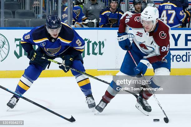 Mikko Rantanen of the Colorado Avalanche controls the puck against Sammy Blais of the St. Louis Blues in the first period at Enterprise Center on May...