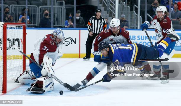 Philipp Grubauer of the Colorado Avalanche blocks a shot on goal by Jaden Schwartz of the St. Louis Blues in the second period at Enterprise Center...