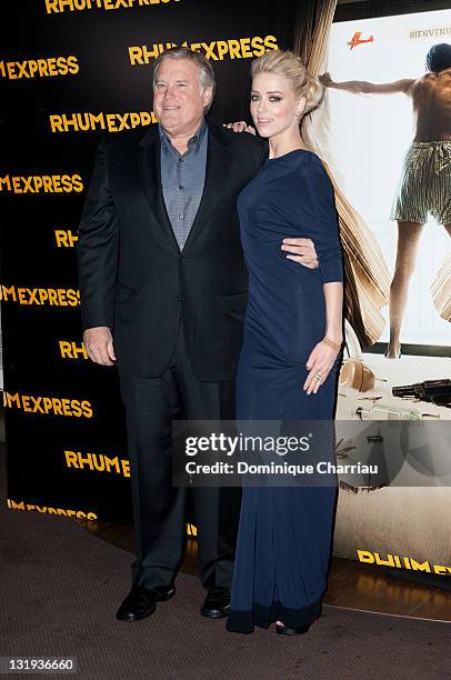 Tim Headington and Amber Heard attend the 'Rhum Express' Paris Premiere at Cinema Gaumont Marignan on November 8, 2011 in Paris, France.