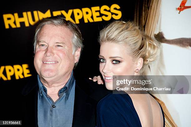 Tim Headington and Amber Heard attend the 'Rhum Express' Paris Premiere at Cinema Gaumont Marignan on November 8, 2011 in Paris, France.