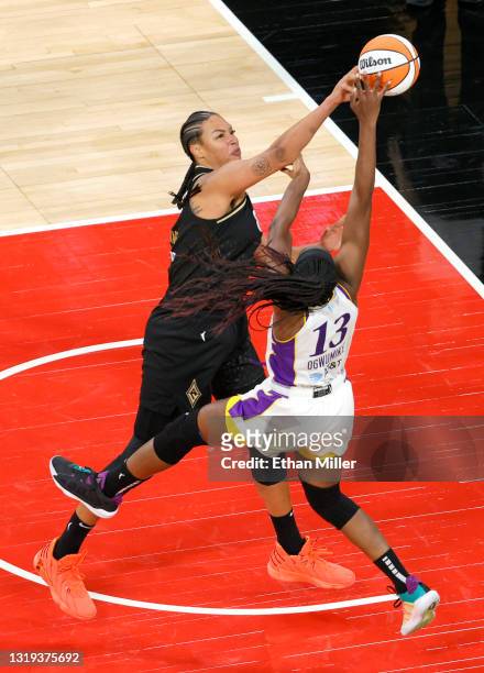 Liz Cambage of the Las Vegas Aces blocks a shot by Chiney Ogwumike of the Los Angeles Sparks during their game at Michelob ULTRA Arena on May 21,...