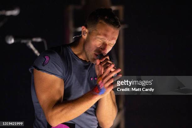 In this image released on May 22nd 2021, Chris Martin of Coldplay performs in front of the main Pyramid Stage as part of the Glastonbury Festival...