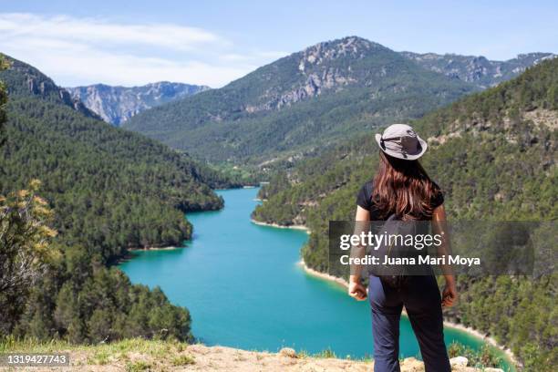 hiker woman contemplates the "anchuricas" swamp in the sierra de segura, jaén province, andalusia, spain - jaen province stockfoto's en -beelden