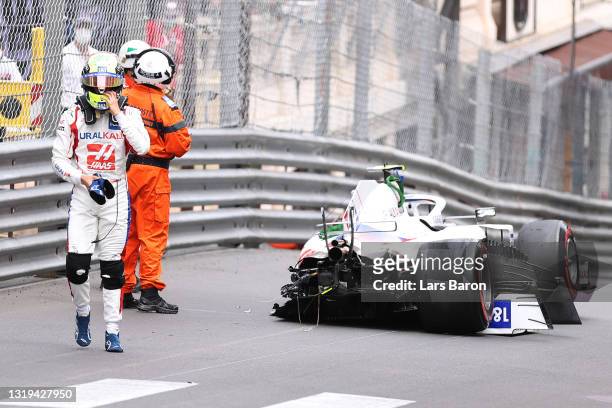Mick Schumacher of Germany and Haas F1 walks away from his car after crashing during final practice prior to the F1 Grand Prix of Monaco at Circuit...