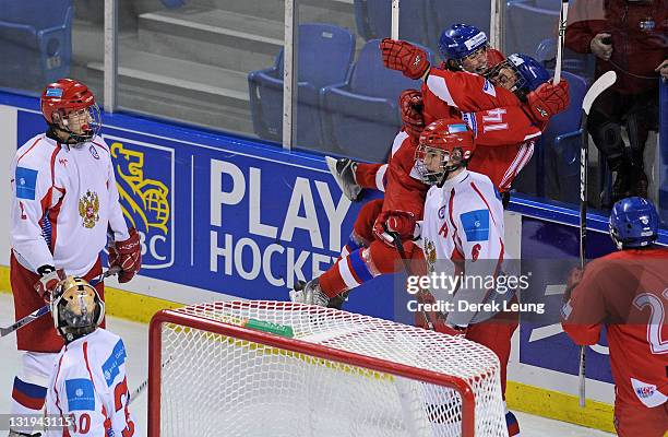 Czech Republic celebrates Martin Prochazka's game winning goal on Andrei Vasilevski of Russia at Langley Events Center on November 8, 2011 in...