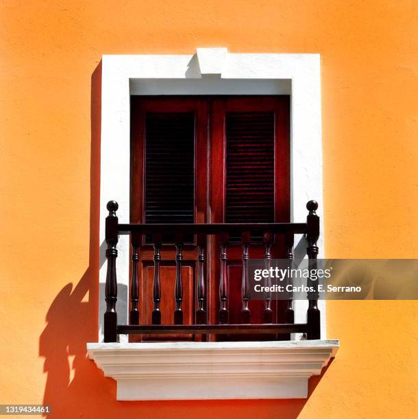 beautiful balcony with wood railing white trim - puerto rico stock pictures, royalty-free photos & images