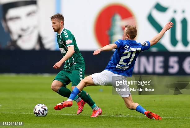 Nik Omladic of Hansa Rostock challenges Sebastian Hertner of VfB Lübeck during the 3. Liga match between Hansa Rostock and VfB Lübeck at...