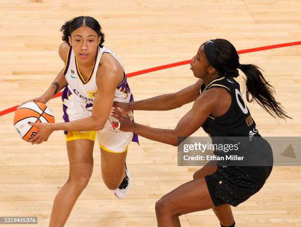 Arella Guirantes of the Los Angeles Sparks looks to pass against Jackie Young of the Las Vegas Aces during their game at Michelob ULTRA Arena on May...