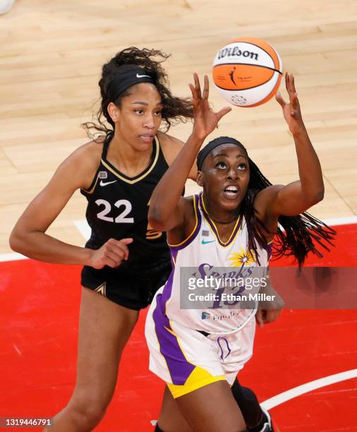 Chiney Ogwumike of the Los Angeles Sparks catches a pass as A'ja Wilson of the Las Vegas Aces defends during their game at Michelob ULTRA Arena on...