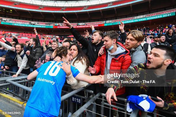 Sam Sheen of Warrington Rylands celebrates with the fans after victory in the FA Vase Final between Binfield and Warrington Rylands at Wembley...