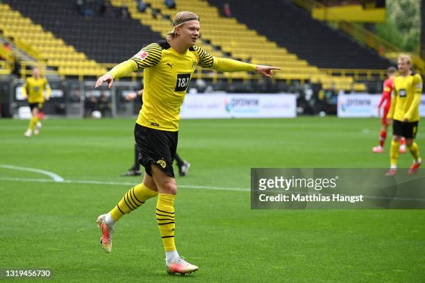 Erling Haaland of Borussia Dortmund celebrates after scoring their team's first goal during the Bundesliga match between Borussia Dortmund and Bayer...