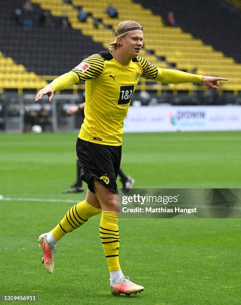 Erling Haaland of Borussia Dortmund celebrates after scoring their team's first goal during the Bundesliga match between Borussia Dortmund and Bayer...