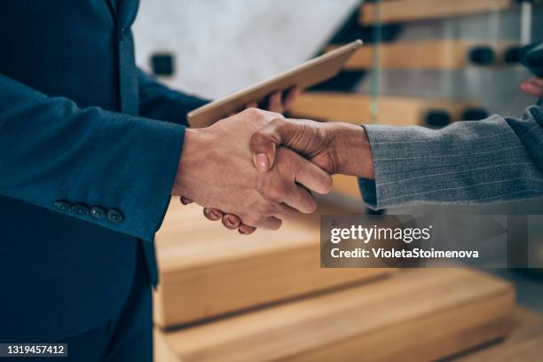 successful partnership - handshake closeup stock pictures, royalty-free photos & images