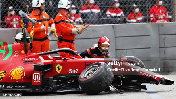 The broken car of Charles Leclerc of Monaco and Ferrari is pictured after he crashed during qualifying for the F1 Grand Prix of Monaco at Circuit de...