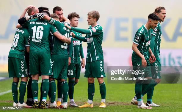 Players of VfB Lübeck react after the 3. Liga match between Hansa Rostock and VfB Lübeck at Ostseestadion on May 22, 2021 in Rostock, Germany. 7500...