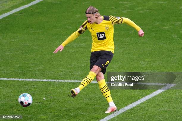 Erling Haaland of Borussia Dortmund scores their team's third goal during the Bundesliga match between Borussia Dortmund and Bayer 04 Leverkusen at...