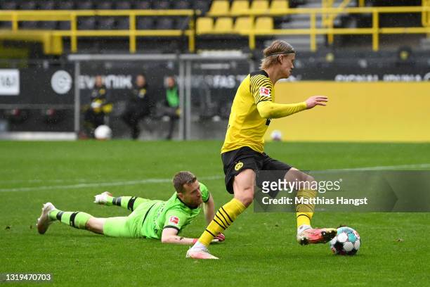 Erling Haaland of Borussia Dortmund scores their team's third goal during the Bundesliga match between Borussia Dortmund and Bayer 04 Leverkusen at...