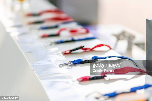 business conference access cards on table - press conference imagens e fotografias de stock