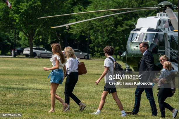 Natalie Biden, First lady Jill Biden, Hunter Biden, Melissa Cohen holding baby Beau Biden, and Hunter Biden walk on the ellipse to Marine One on May...