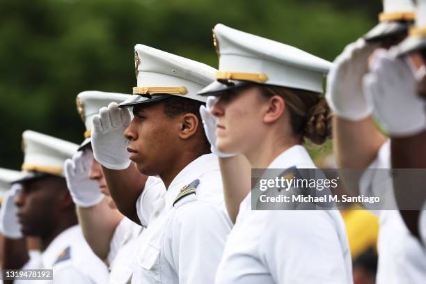 West Point cadets salute as U.S. Secretary of Defense Lloyd J. Austin III arrives for the 2021 West Point Commencement Ceremony in Michie Stadium on...
