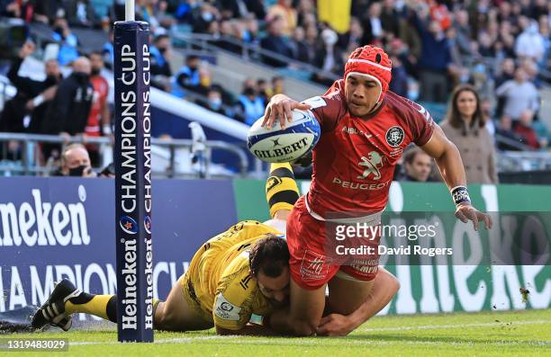 Cheslin Kolbe of Toulouse is tackled into touch just short of the line by Geoffrey Doumayrou of La Rochelle during the Heineken Champions Cup Final...