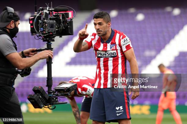 Luis Suarez of Atletico de Madrid celebrates after scoring their side's second goal during the La Liga Santander match between Real Valladolid CF and...