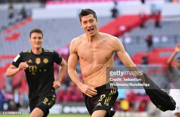 Robert Lewandowski of FC Bayern Muenchen celebrates after scoring their sides fifth goal, scoring his 41st league goal, breaking the record for the...