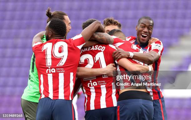 Atletico de Madrid players celebrate winning the La Liga Santander title after victory in the La Liga Santander match between Real Valladolid CF and...