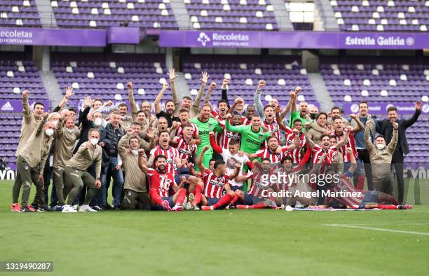 Atletico de Madrid players celebrate winning the La Liga Santander title after victory in the La Liga Santander match between Real Valladolid CF and...