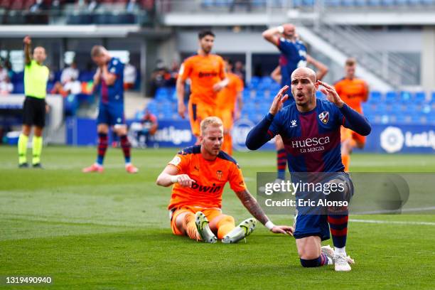 Sandro Ramirez of SD Huesca reacts during the La Liga Santander match between SD Huesca and Valencia CF at Estadio El Alcoraz on May 22, 2021 in...