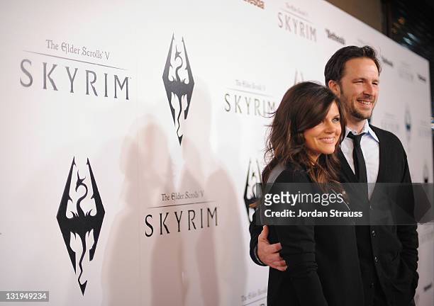 Actress Tiffani Thiessen and husband Brady Smith arrive at the official launch party for the most anticipated video game of the year, The Elder...