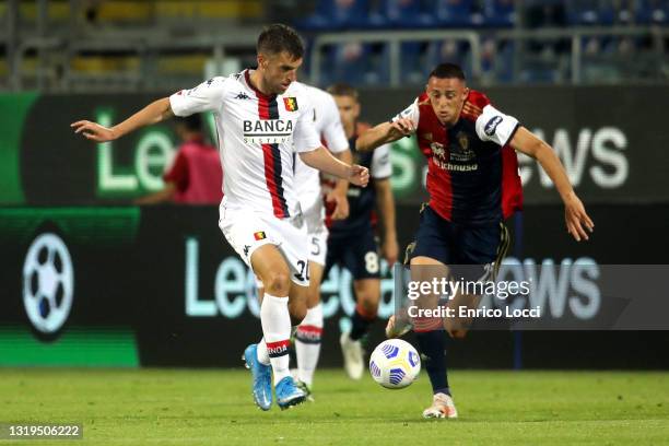 Gabriele Zappa of Cagliari in contrast with Kevin Strootman during the Serie A match between Cagliari Calcio and Genoa CFC at Sardegna Arena on May...