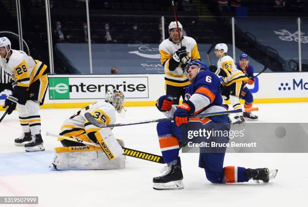 Ryan Pulock of the New York Islanders celebrates his second period goal against Tristan Jarry of the Pittsburgh Penguins in Game Four of the First...