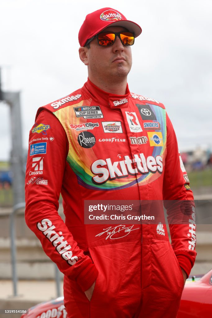 Kyle Boss Kyle Busch, driver of the Skittles Gummies Toyota, waits on the grid ...