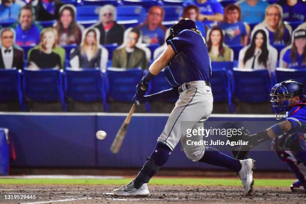 Taylor Walls of the Tampa Bay Rays connects for a double as his first major league hit in the fifth inning of a game against the Toronto Blue Jays at...