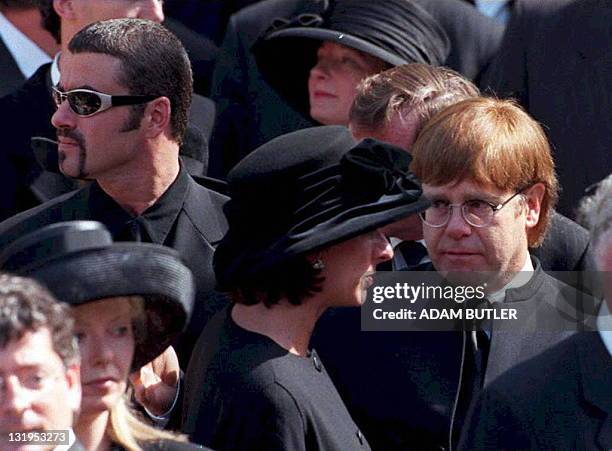 British pop stars Elton John and George Michael leave Westminster Abbey after the funeral service for Diana, Princess of Wales, 06 September. As a...