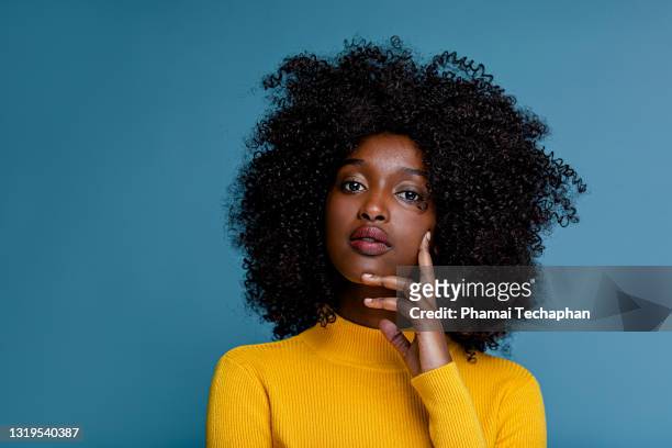 beautiful woman - afro hairstyle stock pictures, royalty-free photos & images