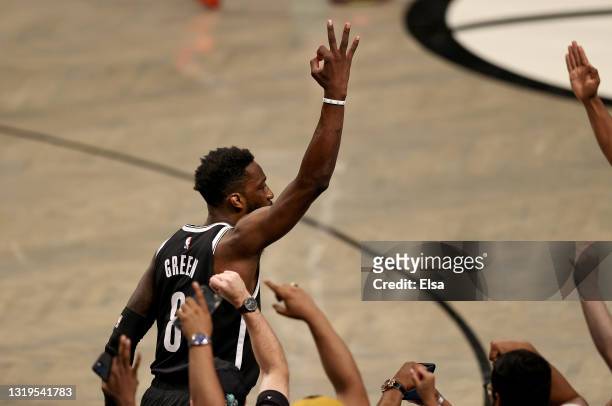 Jeff Green of the Brooklyn Nets celebrates his three point shot in the fourth quarter against the Boston Celtics during Game One of their Eastern...