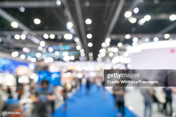 abstract blurred event with people for background - booth fotografías e imágenes de stock